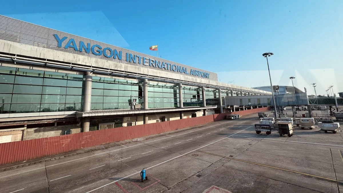 Exterior view of Yangon International Airport with large glass windows