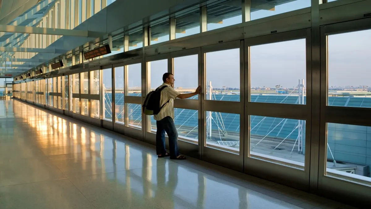 Toronto Airport, Billy Bishop Airport: Which is the Best for You? 8 man standing at toronto airport terminal 11zon